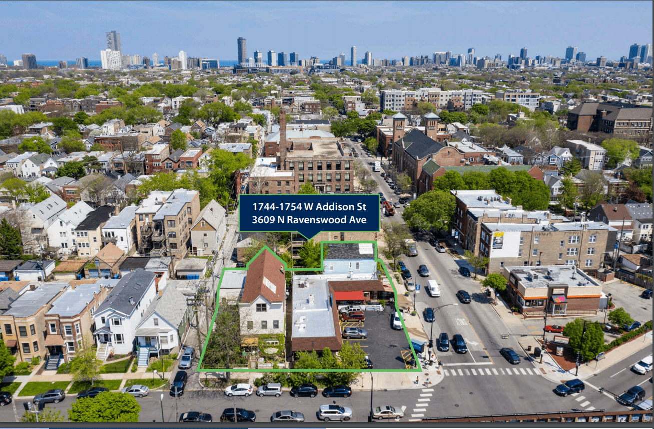 Aerial View of a lot with houses and a parking lot in Chicago - Cawley Commercial Real Estate