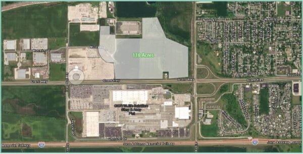 An aerial view of multiple plots of land off of a highway - Cawley Commercial Real Estate