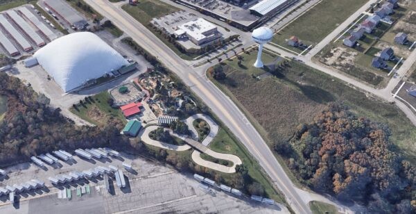 An aerial view of multiple plots of land off of a highway - Cawley Commercial Real Estate