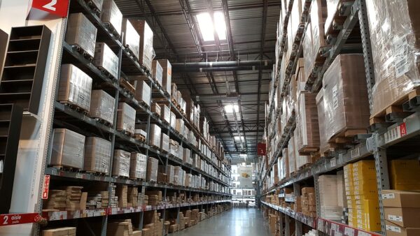 Row of boxes in a large industrial warehouse - Cawley Commercial Real Estate