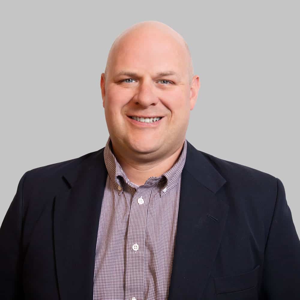 Professional headshot of Dan Gallagher, real estate specialist at Cawley CRE.