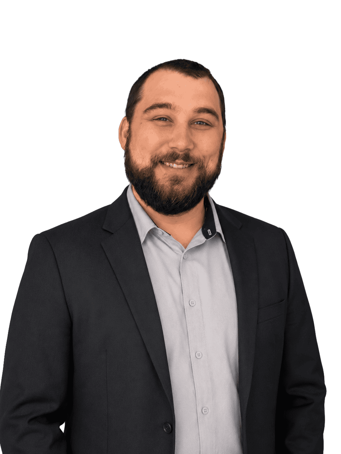 Professional portrait of Josh Goodwin in a suit for Cawley CRE.